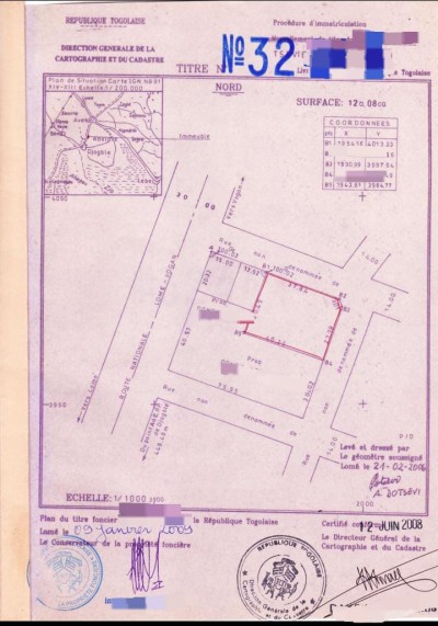 2 lots cloturés avec titre foncier à 30m du goudron