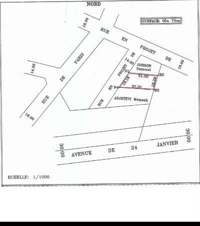 1 lot avec titre foncier  à 50m du goudron