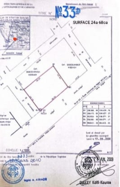 4 lots cloturés avec titre foncier au bord du goudron