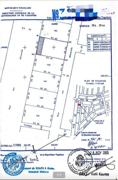 2 lots et démi cloturés avec titre foncier au bord du goudron