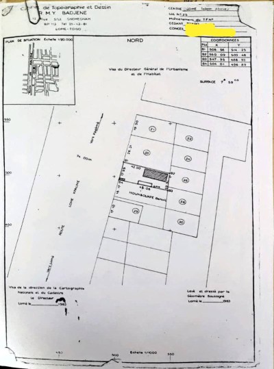 1 lot 1/4 cloturé avec plan+mandat au bord du goudron