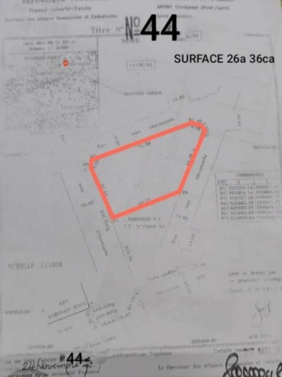 4 lots et démi cloturés avec titre foncier