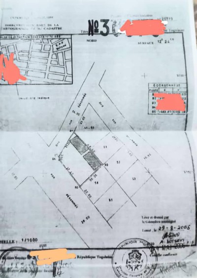 2 lots collés avec titre foncier au bord du goudron