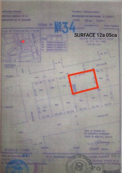 2 lots cloturés avec titre foncier à 200m du goudron