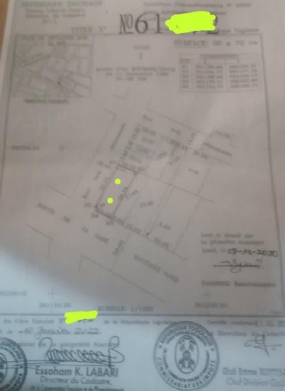 1 lot cloturés avec titre foncier au bord des pavés