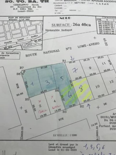 6 lots clôturés avec titre foncier au bord du goudron rn2
