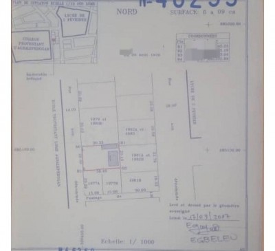 1 lot cloturé avec titre foncier à 100m du goudron