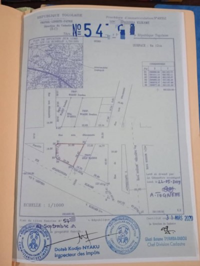 1 lot cloturé avec titre foncier