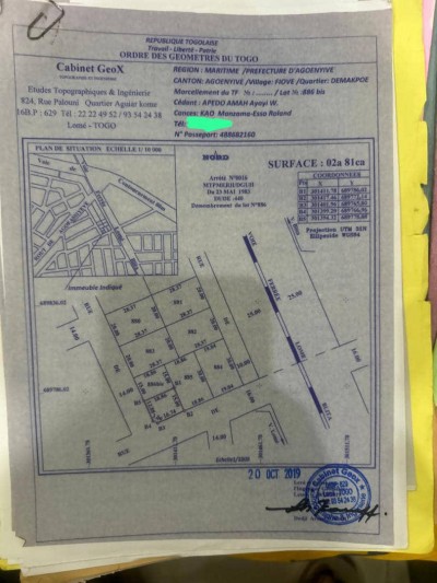 démi lot carré avec titre foncier en cours à 150m du goudron