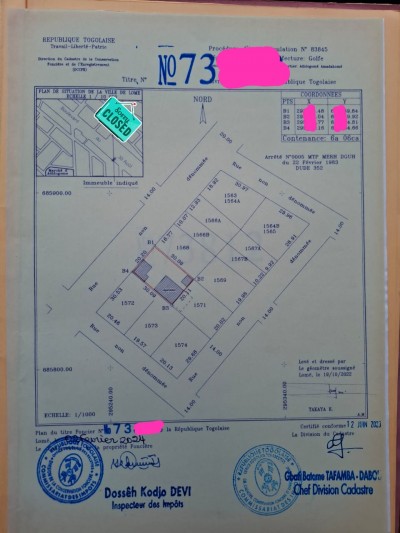 1 lot cloturé avec titre foncier à 100m du goudron