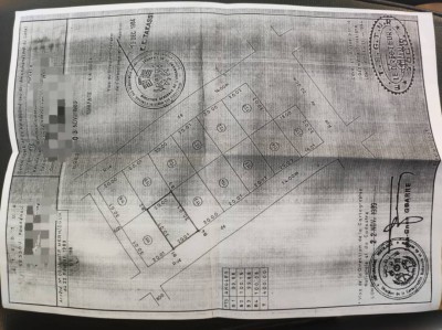 1 lot cloturé avec plan visé à 100m du goudron