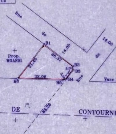 1 lot avec titre foncier au bord du goudron du contournement