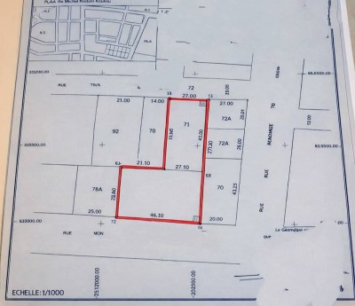 4 lots collés cloturés avec titre foncier à 450m du goudron