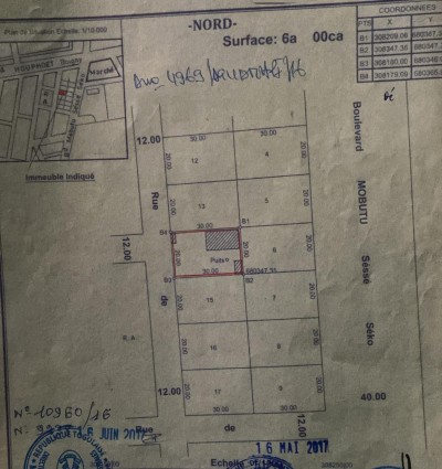 1 lot avec titre foncier global  à 100m du pavé d'Akodésséwa