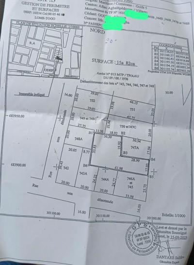 2 lots et démi avec titre foncier au bord du goudron
