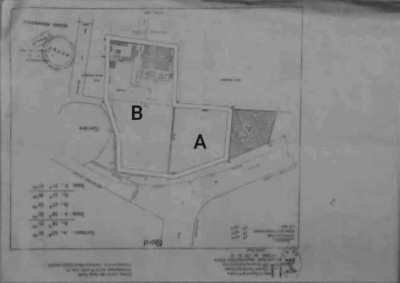 22 lots collés avec 2 titres foncier au bord du goudron